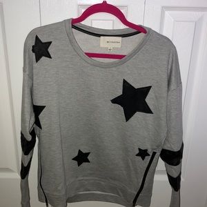 B.P. COLLECTION SWEATER WITH STARS AND ZIPPERS